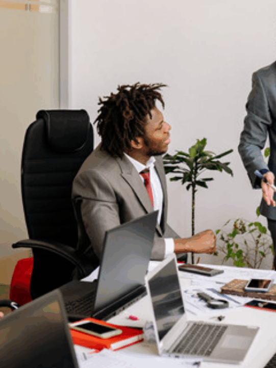 Project leaders discussing priorities in a meeting room